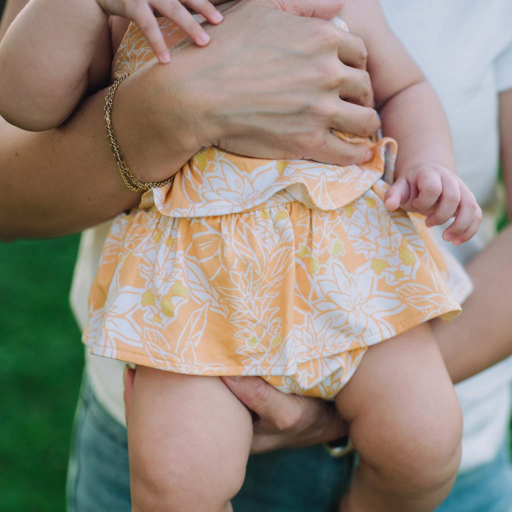 'Olena Tiered Ruffle Onesie