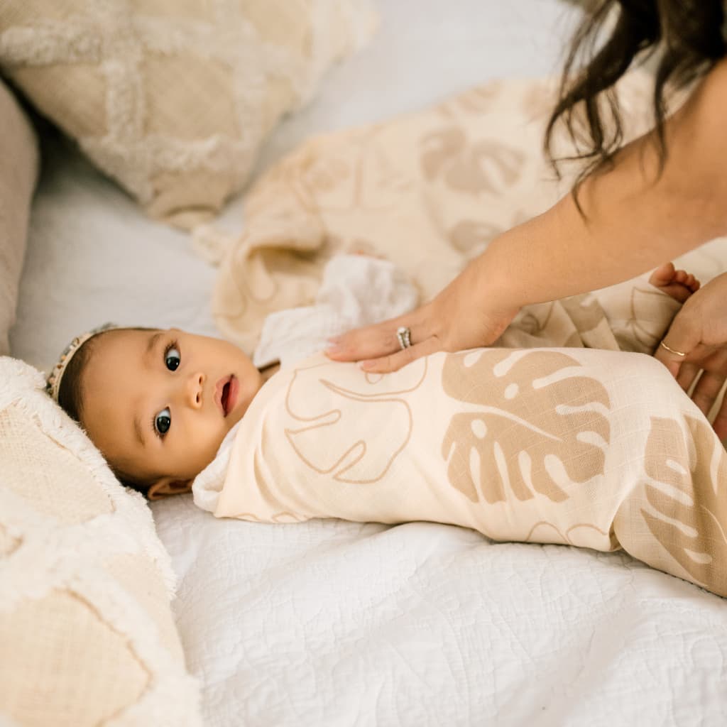 Toasted Monstera Muslin Swaddle Blanket